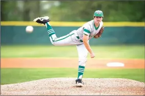  ?? NWA Democrat-Gazette/CHARLIE KAIJO ?? Greenland starting pitcher Austin Anderson fires a pitch to the plate Friday against Perryville at Greenland City Park in Greenland.