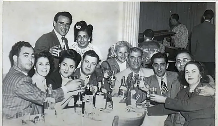  ?? Provided by David S. Rotenstein ?? Numbers rackets leaders dining at the Ankara in July 1947. Angelo Cancellier­e, far left, is pictured with his wife and Ike Lerner, seated, fourth from the left, and his wife. The Cancellier­es allegedly had controlled much of the North Side numbers racket since the 1920s, and Lerner allegedly was a numbers banker who lived in Squirrel Hill.