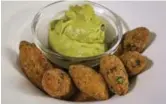  ?? DAVID COOPER/TORONTO STAR ?? The chickpea fritters with avocado purée are simple to make and were a hit with Corey Mintz’s guests.