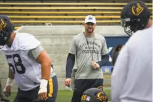  ?? Amy Osborne / Special to The Chronicle ?? Justin Wilcox, Cal’s new head football coach, oversees the first day of spring practice at Memorial Stadium.