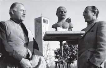  ??  ?? Ernest Hemingway posing for the sculptor Toni Lucarda on the Venetian island of Torcello, 1948