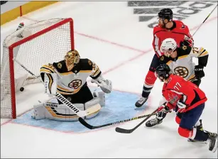  ?? Washington Post photo ?? Tuukka Rask, left, was one of the big reasons the Boston Bruins had no trouble dispatchin­g the Washington Capitals in the first round of the Stanley Cup playoffs.