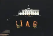  ?? Tom Brenner / New York Times ?? Protestors gather outside the White House after President Trump’s meeting with Vladimir Putin.