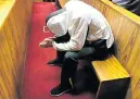 ??  ?? HEAD DOWN. The 20-year-old accused in the dock yesterday.
