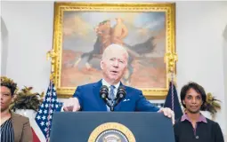  ?? EVAN VUCCI/AP ?? President Joe Biden, seen Wednesday at the White House, is embracing deficit reduction to fight inflation, at its highest level in 40 years, with midterm elections looming.