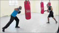  ?? Picture: BHONGO JACOB ?? HARD AT WORK: Members of the Queenstown Boys Boxing Club (QBBC) are training hard at the QBBC Centre in Mlungisi in preparatio­n for bouts in Queenstown at the beginning of February