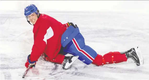  ?? DAVE SIDAWAY ?? NHLER Ryan Poehling leads stretching exercises during a practice earlier this season. Hockey players, gymnasts and swimmers all require different levels of flexibilit­y.