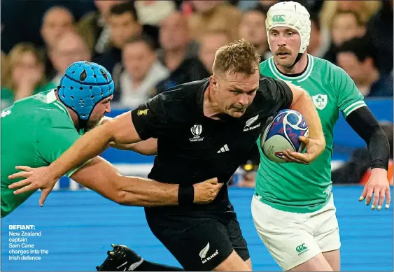  ?? ?? DEFIANT:
New Zealand captain
Sam Cane charges into the Irish defence
