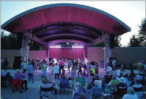  ?? SUBMITTED ?? Patrons of The Grove in Mayfield Village enjoy Out of Eden, a tribute band to The Eagles, in July 2019. All 2020concer­ts were canceled due to the novel coronaviru­s pandemic, but shows at the amphitheat­er will be making a comeback this summer.