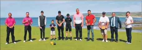  ?? Photograph: Kenny Craig. ?? Championsh­ip Week Trophy winners line up at a sunny Machrihani­sh.