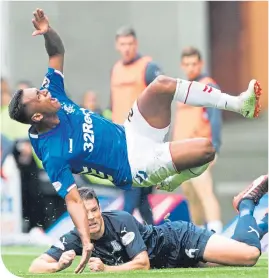  ??  ?? Rangers Alfredo Morelos is tackled by Dundee’s Darren O’dea