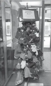  ?? Photo submitted ?? FSG students/staff donated multiple pairs of mittens/ gloves and enjoyed the staff videos of reading books about homelessne­ss. The image below is of the mitten tree at FSG.