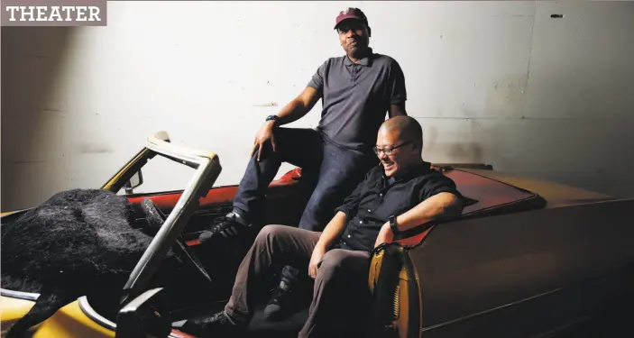  ?? Santiago Mejia / The Chronicle ?? “Black Odyssey” playwright Marcus Gardley and California Shakespear­e Theater Artistic Director Eric Ting sit on a prop for the show, based on Homer’s epic.