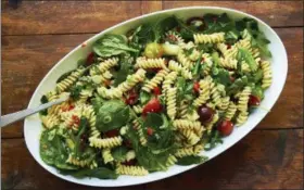  ?? MIA VIA ASSOCIATED PRESS ?? This photo shows simple vegetarian spring pasta salad in New York.