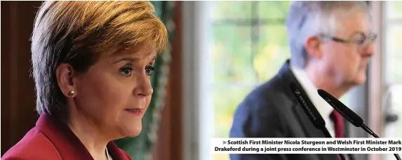  ??  ?? > Scottish First Minister Nicola Sturgeon and Welsh First Minister Mark Drakeford during a joint press conference in Westminste­r in October 2019