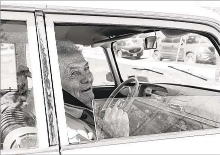  ?? JILLIAN FREYER NYT ?? Celebrity chef Jacques Pépin in a 1965 Peugeot 404 in Branford, Conn.