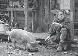  ?? PROVIDED BY DAVID REAMER ?? Rob ( Nicolas Cage) lives in the mountains with his treasured pig in Michael Sarnoski’s “Pig.”