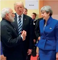  ?? PTI ?? Narendra Modi interacts with US President Donald Trump and British Prime Minister Theresa May at the G-20 Summit in Hamburg on Friday. —