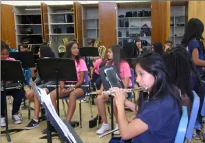  ?? WILLIAM ROLLER PHOTO ?? The Wilson Junior High School Band rehearses at the school on Wednesday.