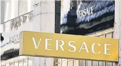  ?? — Reuters photo ?? Versace, known for its bold and glamorous designs and its Medusa head logo, is one of a clutch of family-owned Italian brands cited as attractive targets at a time when the luxury industry is riding high on strong demand from China.