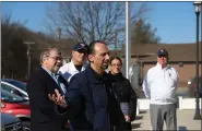  ??  ?? Mangia! owner, Joe Folino, thanks the Patriotic Order Sons of America Washington Camp #211 during a flagpole and flag dedication ceremony Saturday Mangia! Italian Restaurant and Pizzeria in Cumru Township. The pole, along with an American flag, was installed by to show appreciati­on to Mangia! owners, Joe and Anna Folino.