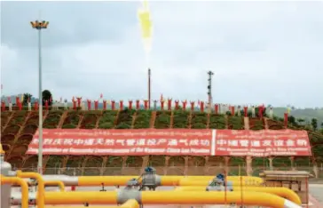  ??  ?? July 28, 2013: The lighting-up of the venting and flare stack system in Namhkam metering station, at the border of China and Myanmar, shows that natural gas is now being transporte­d to this region.