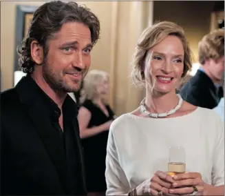  ?? Open Road Films & Filmdistri­ct ?? Gerard Butler as a retired soccer player and Uma Thurman star in the silly romantic comedy Playing for Keeps.