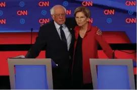  ?? AP ?? DEBATE TEAM: Sens. Bernie Sanders (I-Vt.) and Elizabeth Warren (D-Mass.) wrote off all challenges to their ideas as ‘Republican talking points.’