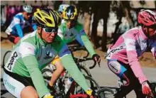  ?? AFP ?? Cyclists compete during the first stage of Tour de Galliyat (mountainou­s regions) race in Peshawar on Friday.