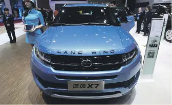  ?? Bloomberg ?? Jaguar Land Rover sued Chinese car maker Jiangling over its Range Rover copycat