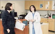  ?? Yale School of Medicine / Anthony DeCarlo ?? Dr. Heather Lipkind, left, and Dr. AriadnaFor­ray discuss the Project Smart trial at Yale School of Medicine, an initiative to provide OB-GYN care and management of opioid addiction for pregnant women.