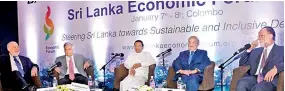  ??  ?? From left: Nobel Laureate Joseph Stiglitz, Prime Minister Ranil Wickremesi­nghe, President Maithripal­a Sirsena, billionair­e George Soros and Prof. Ricardo Hausmann at the Sri Lanka Economic Forum held in January 2016