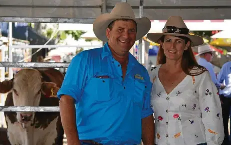  ?? PHOTO: ANDREA DAVY ?? IN TOWN: Undoolya Station owners Ben and Nicole Hayes at Beef Australia 2018. The couple will host the bronco branding finals this year.