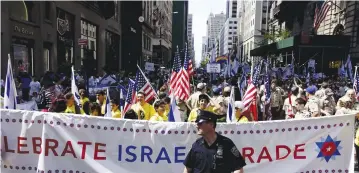  ?? (Eduardo Munoz/Reuters) ?? THE 2015 Israel Parade in Manhattan. Recurrent friction and unresolved issues have strained and weakened the links over the last 10 to 20 years, says the report’s author.