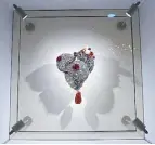  ??  ?? The “Heart” was one of Saint Laurent’s emblematic jewelry pieces: Created in 1962 by the House of Scemama, it served as a talisman for his haute couture and ready-towear fashion shows, worked into a specific design or worn by a model whom Saint Laurent...