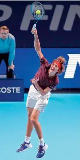  ?? AFP ?? Germany’s Alexander Zverev serves to Marin Cilic of Croatia during their ATP World Tour Finals roundrobin match in London on Sunday. —