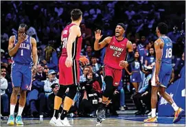  ?? MATT SLOCUM / AP ?? Miami Heat’s Jimmy Butler (22) reacts during the second half of Game 6 against the Philadelph­ia 76ers Thursday in Philadelph­ia.