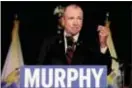  ?? JULIO CORTEZ — THE ASSOCIATED PRESS ?? New Jersey Democratic gubernator­ial nominee Phil Murphy speaks to supporters during his election night victory party at the Asbury Park Convention Hall, Tuesday in Asbury Park, N.J.