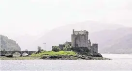  ?? Kim Horton Levesque photos ?? Eilean Donan, the castle that inspired the fortificat­ion in “Brave,” is a roughly two-hour drive from Inverness.