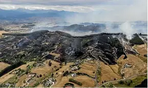  ??  ?? An aerial photo show the fire ground from Pigeon Valley to the Redwood Hills in Tasman.