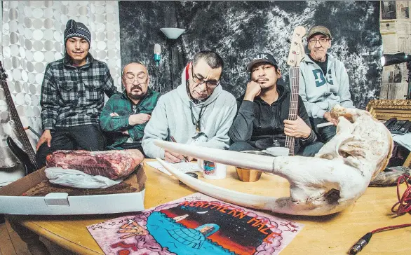  ??  ?? Northern Haze, an Inuk metal band first formed 34 years ago, has a new lineup that includes, from left, Allan Kangok, Naisana Qamaniq, James Ungalaq, Derek Aqqiaruq and John Inooya.