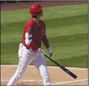  ?? Associated Press ?? WATCHING IT FLY
The Angels’ Shohei Ohtani follows through on a two-run home run during the third inning of a spring training game against the Cleveland Indians pm Tuesday in Tempe, Ariz.