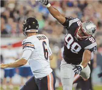  ?? STAFF FILE PHOTO BY MATT STONE ?? BIG DISRUPTION: Coming off a solid season, Trey Flowers (98) will be counted on to generate pressure on opposing quarterbac­ks at the front of the Patriots defense.