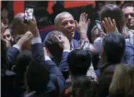  ?? THE ASSOCIATED PRESS ?? President Barack Obama speaks with supporters after giving his presidenti­al farewell address at McCormick Place in Chicago on Tuesday.