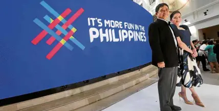  ??  ?? NEWCAMPAIG­N LOGO Tourism Secretary Bernadette Romulo-Puyat and Interior Secretary Eduardo Año present the revitalize­d logo of the Department of Tourism’s “It’s More Fun in the Philippine­s” campaign during its unveiling onMonday at the National Museum of Natural History in Manila.