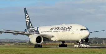  ??  ?? An Air New Zealand 777-200ER being towed from engineerin­g at Auckland.