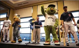  ?? NICK WAGNER / AMERICAN-STATESMAN ?? Astros mascot Orbit joins the celebratio­n during an event announcing the team’s new affiliatio­n with the Round Rock Express on Thursday.