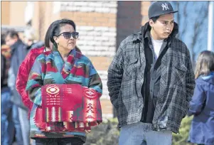  ?? CP PHOTO ?? Debbie Baptiste, the mother of Colten Boushie, and her son Jace Baptiste leave the provincial court during a stoppage in court proceeding­s over the lunch hour on the first day of preliminar­y hearing investigat­ing the murder of Colten Boushie in North...