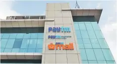  ??  ?? The headquarte­rs for Paytm, India’s leading digital payments firm, in Noida, India. Paytm counts China’s Alibaba Group and Japan’s SoftBank Group Corp among its investors. – Reuters photo