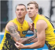  ?? ?? Richmond’s Dustin Martin and Tom Lynch put in the hard yards at a training session. Picture: Michael Klein